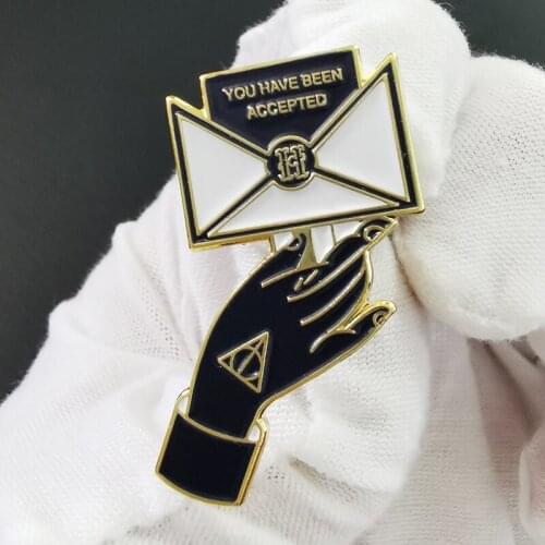 Acceptance letter brooch