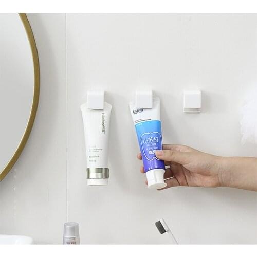 Bathroom hanging clip Multi-purpose bathroom toothpaste cleanser rack plastic toothpaste clip storage clip bathroom storage