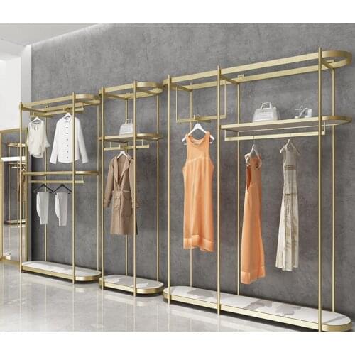 Simple clothing store showcase floor formula womens shelf network red Na rice gold iron hanger