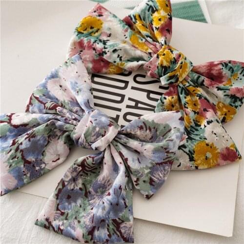 Spring and summer new Japanese and Korean version flower breaking big bow hairpin fashion style female sweet versatile spring cl