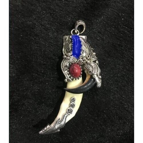 Tibetan antiques Wolfs teeth Bear claw Tibetan silver mosaic Red pine amulet