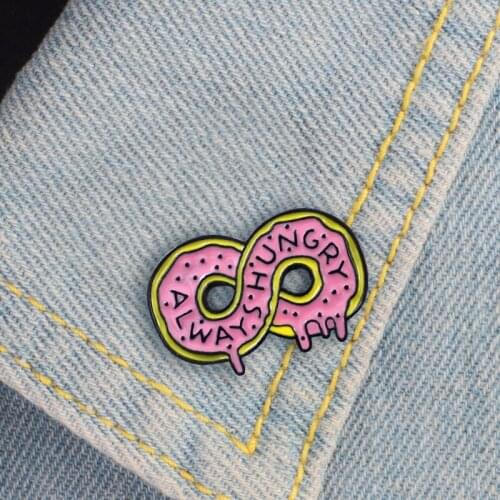 The number "8" shape donut and the word "always hungry" above mean that all the way forward stylish personality brooch