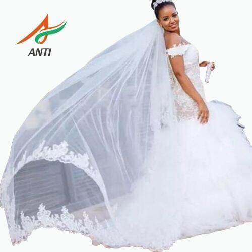 ANTI Beach Mermaid Wedding Dress 2019 V-neck short Sleeve African Luxury Crystal Appliques Lace Bridal Gowns White Wedding LM191
