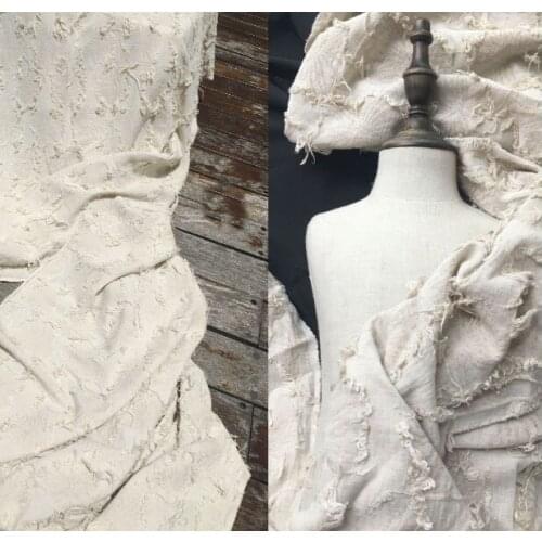 Beige cotton and linen jacquard fringed wide-leg pants background clothing designer fabric