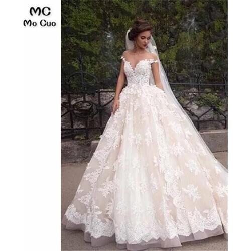 Unique Ball Gown Wedding dresses Corset Bodice Appliques Lace Cap Sleeves Wedding Gowns