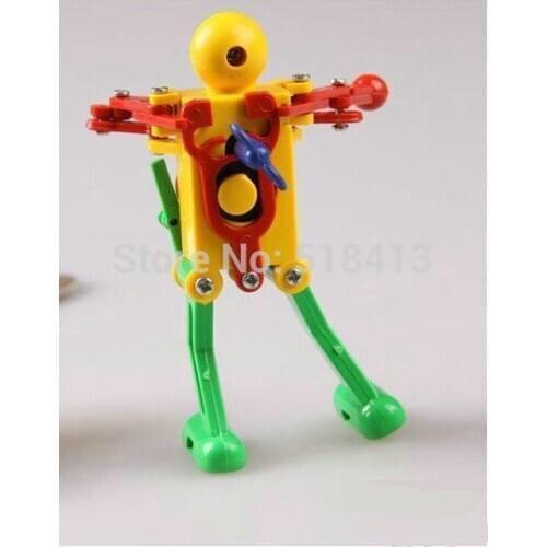 Human children plastic funny toy Human Children Plastic Funny Toy Clockwork Robot Can Dance Twist Ass Childrens
