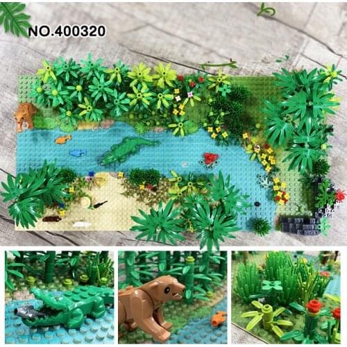 Small particles of tropical rain forest flowers and forest side scene trees animal plants scene MOC neutral