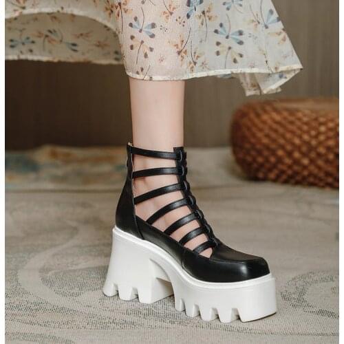 Thick-soled Roman sandals womens summer 2021 new leather sponge cake hollow thick-heeled high-heeled Roman shoes ins tide