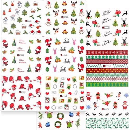 A new set of brightly colored glittering Christmas stickers is used to decorate the tips with nail slide foil filiform stickers