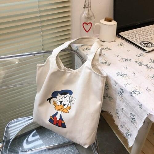 Disney cartoon Mickey Donald Duck womens one-shoulder all-match vest bag student fashion hand carry large capacity canvas bag