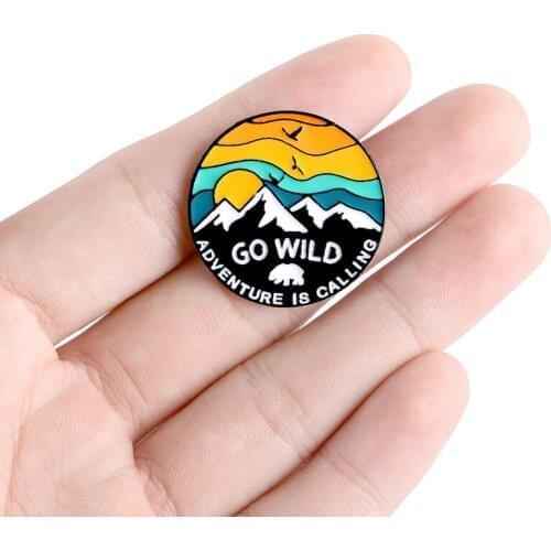 Outdoor travel adventure mountain peak Sunset Polar bear Flying bird Round badge "GO WILD" Mountain adventure enamel brooch