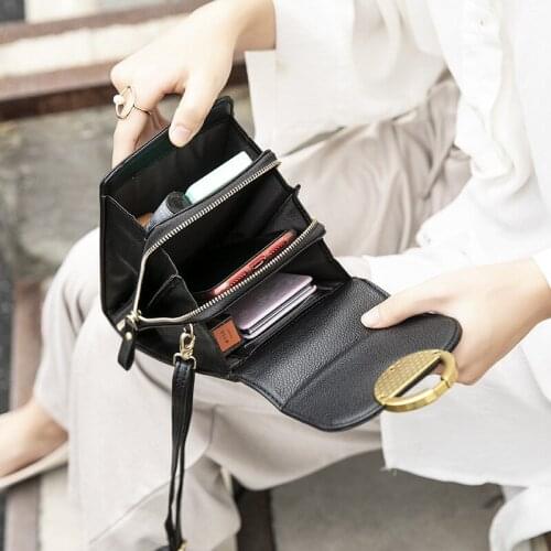 The new Korean version of the mobile phone bag for women is a stylish, versatile, large-capacity mobile phone bag for women