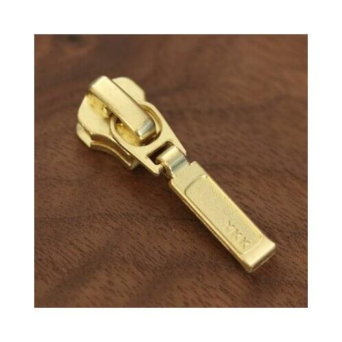 Free shipping 10pcs/lot Authentic YKK metal zipper pull head lock zipper head 5# golden self-locking 5M DA8DR7
