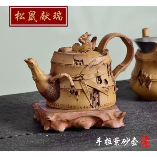 Xuandiao Yixing famous purple clay pot handmade raw ore squirrel bamboo section teapot and tea set for household use