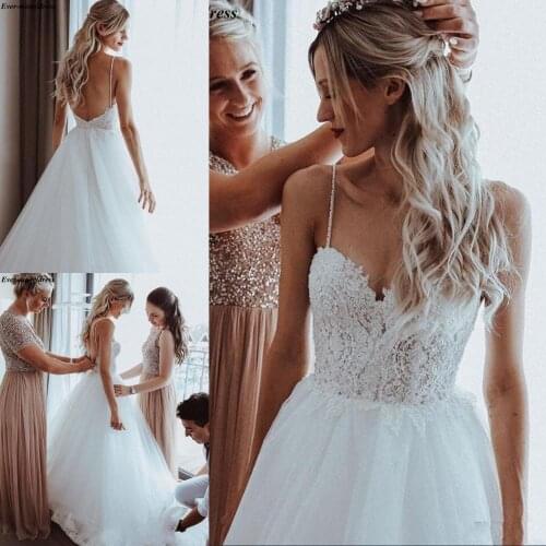 Beach Backless Wedding Dresses 2020 Spaghetti Straps A-Line Summer Lace Appliques Pearls Floor Length Bridal Gown Robe De Mariee
