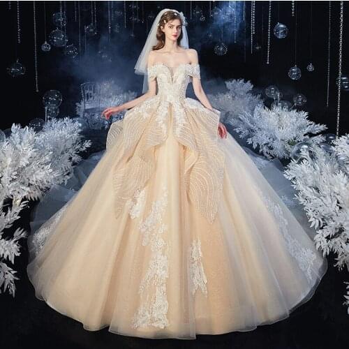 Sexy Off the Shoulder Champagne Wedding Dresses Court Train Long Bridal Gowns Applique with Beads Layers Organza with Tulle