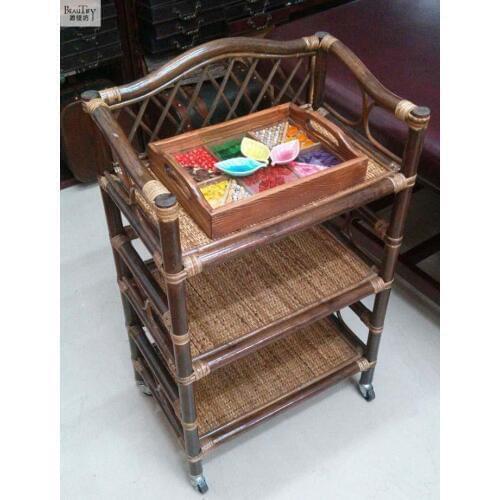 The cane makes up by hand trolley. Household cart. Beauty salon cart. Beauty tool