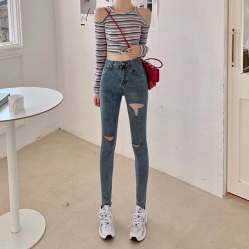 Spot Chinese new womens pants personality trend retro show thin high waist elastic hole small foot nine minutes pants