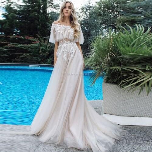 Charming Nude Tulle Wedding Dresses A Line Off Shoulder Tuffles Sleeves Lace Appliques Buttons Back Bridal Gown Foraml Vestidos