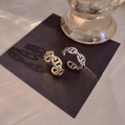 Metal knotted retro ring female fashion simple cold wind design sense hollow net red ring