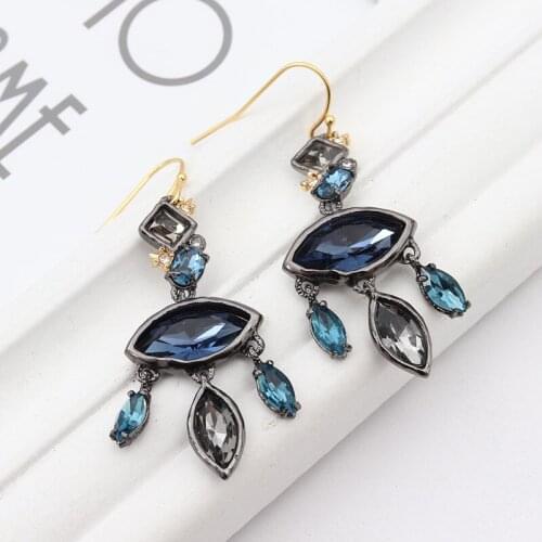 Gem inlay irregular design European and American ghost designer earrings fashion art earrings