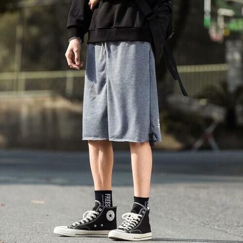 Summer sports shorts male loose five-point pants Japanese trend new casual beach pants couple five-point pants