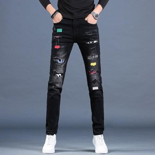 Mens hole embroidery black jeans mens trendy brand self-cultivation feet pants trendy casual pants summer thin pencil jeans