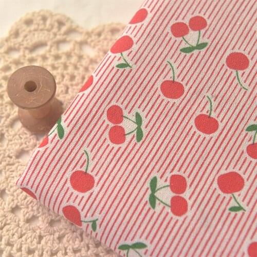 High quality cotton flax fabricRed and white striped cherry tissu High-end dresses clothes vestidos material