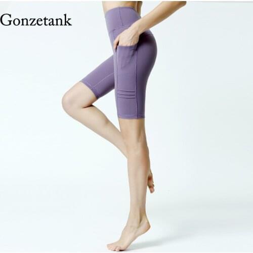 2021 New Female Five-point Yoga Sweatpants Nude Skin-friendly Pocket Shorts High Waist Tight Fitness Pants Running Riding Shorts