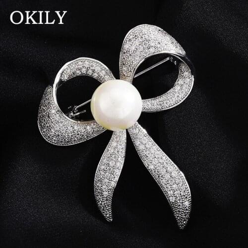 Elegant Rhinestone Bowknot Brooches for Women Pearl and Zircon Brooch Pin Vintage Winter Clothing Jewelry Accessories