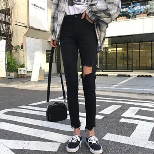 2020 New Black Tight Ripped Jeans Womens High-waisted Slim Pencil Trousers With Small Feet Show Thin Fashion Zipper Burrs