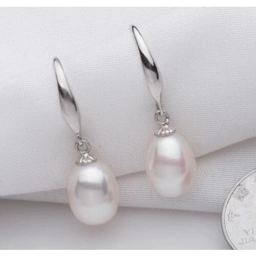 Charming pair of south sea 11-12mm round white pearl earring925s