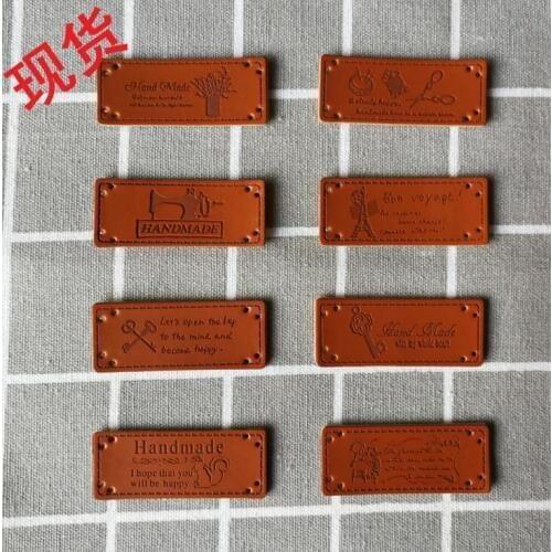 20pcs free shipping Sew on garment PU leather labels handmade Labels for clothes Jeans Bags Shoes decoration