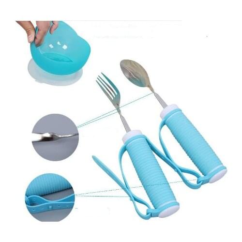 Old man hand disability to help feed a fork protectors patient care disability old man eating dinner