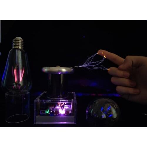 Tesla Coil Artificially Initiated Lightning Wireless Light on Experimental Tools for Science and Education Magnetic Storm Coil