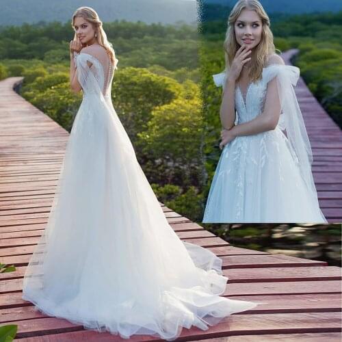 Boho Chic Cap Sleeve Wedding Dress Scoop A Line Tulle Bridal Gowns Saudi Arabic Backless Bridal Gowns with Bow