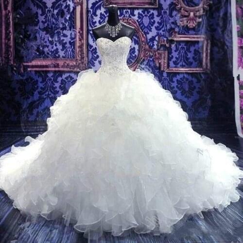 2021 Luxury Beaded Embroidery Ball Gown Wedding Dresses Princess Gown Corset Sweetheart Organza Ruffles Cathedral Train Bridal