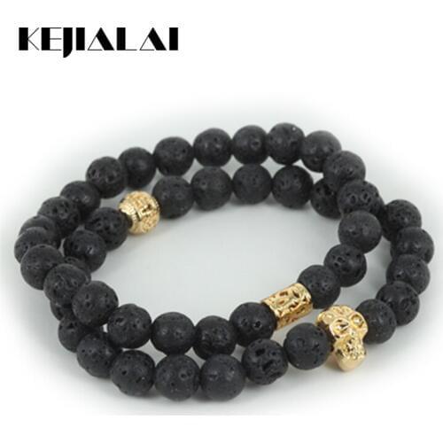 KEJIALAI 2pcs Hot Beaded Gold Skull Head Men Stretch Bracelet Natural Volcanic Round Stone Beads Charm Women Bracelet A0568