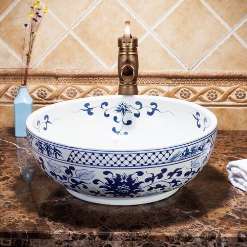 China Artistic Ceramic wash basin Round Counter top ceramic antique wash basin sink bathroom blue and white