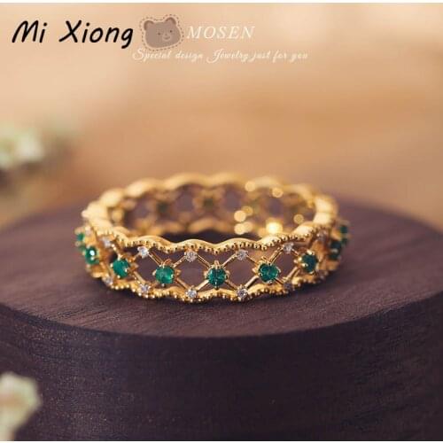 Mi Xiong s925 sterling silver gold-plated hollow emerald ring unique designer craftsmanship charm ladies brand jewelry