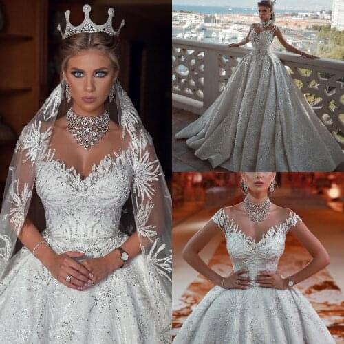 Luxury Ball Gown Wedding Dresses Lace Appliqued Short Sleeve Beaded Sequined Sheer Neck Custom Made Dubai Arabia Bridal Gowns