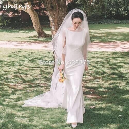 YNQNFS W101 Elegant White 2020 Bridesmaid Dresses Backless Mermaid Dress Simple Boho Wedding Party Dress Formal Gown