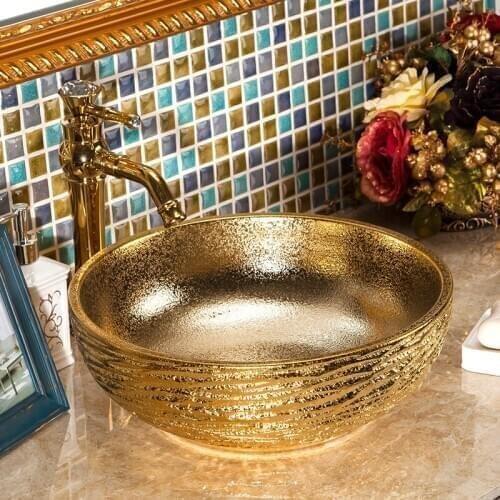 Golden ceramic washroom wash basin for home