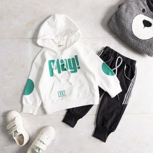 Boys and girls suit new spring and autumn letter sweater top with hood long sleeve + sports trousers feet two-piece baby suit