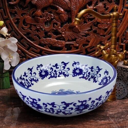 China Artistic Handmade Blue And White Counter top Ceramic Bathroom Vessel Sink bathroom sink bowl