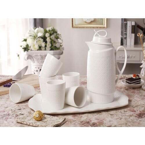Modern Style Elegant Bone China Water Kettle and Cup Set with Engraving Flower Pattern White Colour