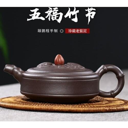 Gu Pengcheng, a famous wholesaler of all hand-made purple clay teapot and tea set manufacturer