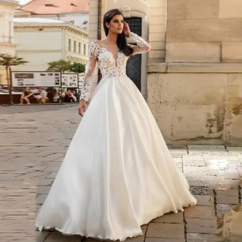 Jiayigong Long Sleeve Wedding Dress Sexy Scoop Neck Beading Pearl Applique Backless Ball Gown Bridal Gowns