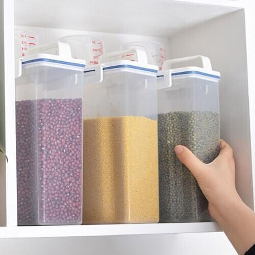 Portable storage box suitable for cereals and oatmeal storage tank with measuring cup