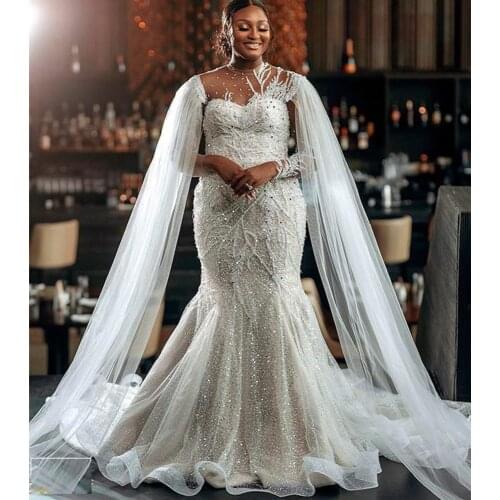 2021 Plus Size Arabic Aso Ebi Sparkly Mermaid Beaded Wedding Gowns Sheer Neck Lace Sexy Long Sleeves Bridal Dresses